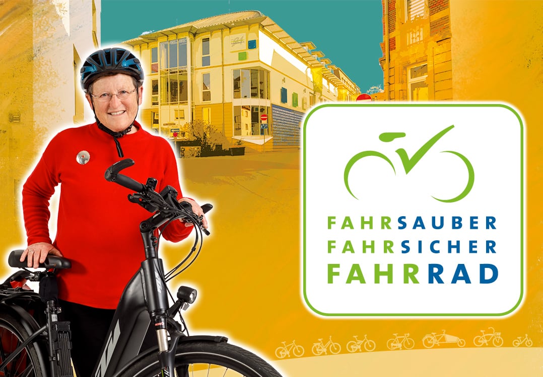 Eine ältere Frau mit E-Bike